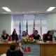 A imagem mostra sete mulheres debatendo na OAB